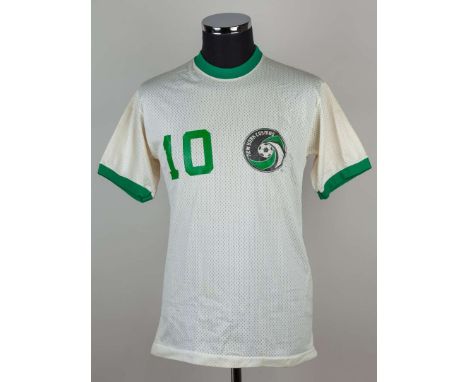 Pelé white New York Cosmos No.10 shirt, circa 1976, by Champion, Aertex, short-sleeved, green No10 and PELE lettering.&nbsp;T