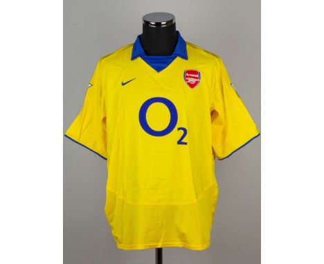 Thierry Henry yellow and blue No.14 Arsenal match worn short-sleeved shirt, 2003-04, Nike, L, with v-neck collar embroidered 