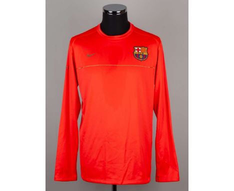 Thierry Henry an official orange Barcelona worn training top, Nike, L, with embroidered cloth badge, the collar inscribed TH1