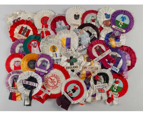 A collection of rosettes from 1965-1966 including England, Manchester United, Wigan, Hunslet, Spurs, Newcastle United, Leeds 