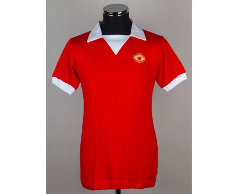 Rare red and white No.11 Manchester United short-sleeved shirt, 1970s, Umbro, 38/40, with v-neck style collar and embroidered