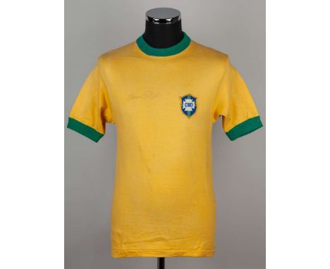 Pele yellow and green No.10 short-sleeved shirt, 1970, Athleta, with crew-neck collar and embroidered cloth badge inscribed C