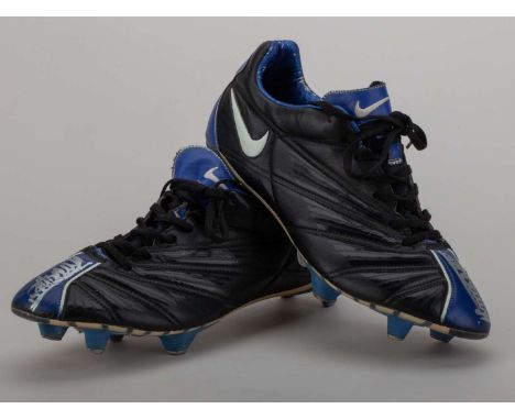 Thierry Henry a pair of black and blue Nike match worn football boots, the toe of each boot autographed by Henry.&nbsp;The fo