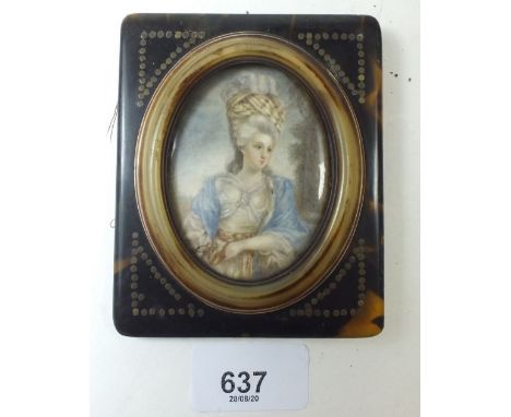 A French 19th century watercolour on ivory portrait of a women with ornate headdress 6.5 x 5cm within a rectangular tortoises