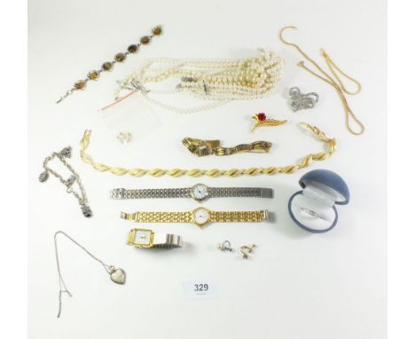 A selection of yellow metal and other costume jewellery to include necklaces, bracelet, pearl necklace, watches etc. 