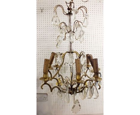 A mid 20th century French eight branch cut glass and gilt metal chandelier 