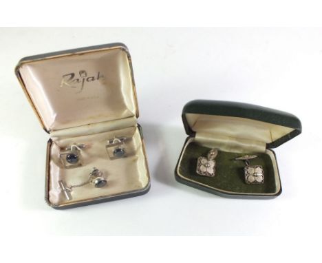 A pair of Rajah gentleman?s modernist cufflinks together with silver filigree cufflinks 