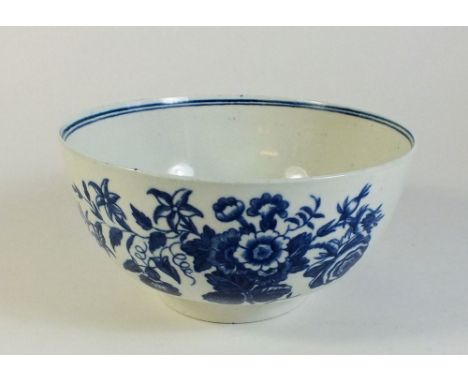 A Royal Worcester late 18thC porcelain blue and white bowl in a floral and butterfly pattern - 14cm diameter. 