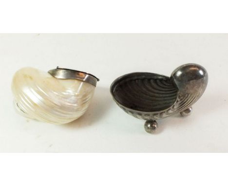 A mother of pearl shell form snuff box with white metal lid together with a plated shell form salt pot