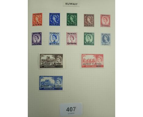 Red 'Kent' stamp album of mainly British Empire and Commonwealth mint and used defin, commem and officials from Middle and Fa
