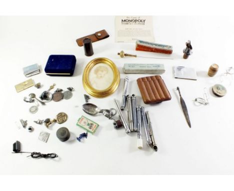 A box of small collectables to include tyre pressure gauges, small watercolour portrait etc. 