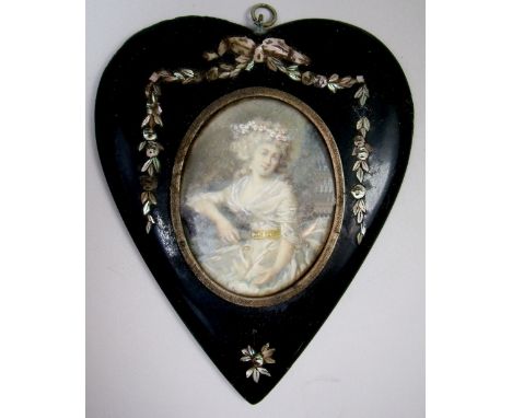 A late 18th century/early 19th century French water colour on ivory miniature portrait of a fashionable noble women, within p