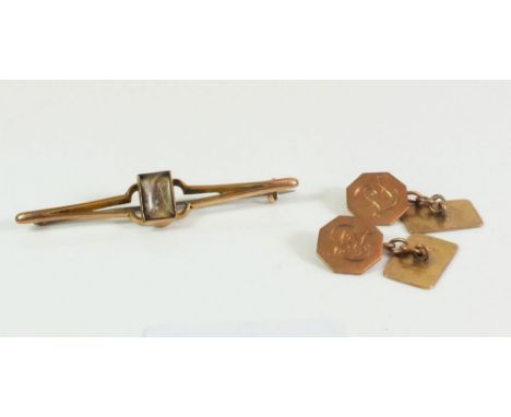 A pair of 9 carat gold cufflinks 6.5g and a 9 carat gold brooch 2.2g 