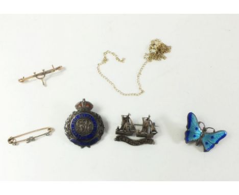 An enamel butterfly brooch, two Edwardian yellow metal bar brooches, fine gold chain etc 