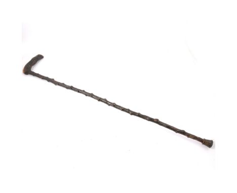 A 19th century folk brussel sprout stem walking stick.