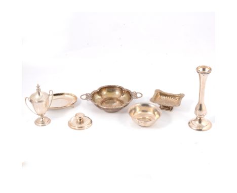 Small collection of silver, including a small urn-shape trophy, spill vase, paperweight, pedestal salt, bon bon dishes.