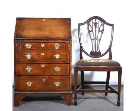 George II style walnut bureau, of small size, early 20th Century, with cross-banding, slope front enclosing a fitted interior