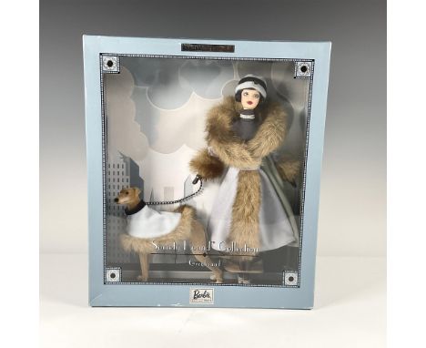 Limited Edition. Society Hound Collection. New in original sealed box. She and her hound are dressed in faux fur lined over c