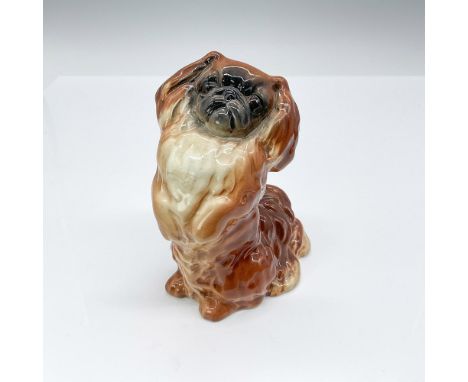 A light auburn-colored dog with a black face, finished in a high-gloss glaze. Beswick backstamp. Issued: 20th centuryDimensio