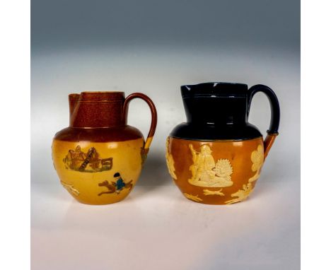 This pair of Royal Doulton stoneware hunting jugs showcase a smaller hand-painted jug with brown and tan base and delicate ap