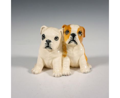 Limited edition ceramic figure featuring two sitting adorable bulldogs. Produced exclusively for U. K. I. Ceramics LTD. Royal