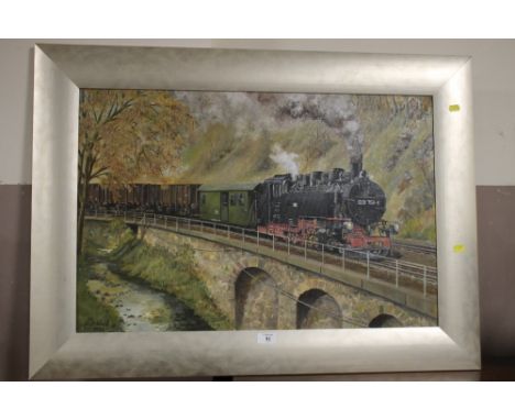 A LARGE FRAMED OIL ON BOARD OF A STEAM ENGINE SIGNED G D WOOD