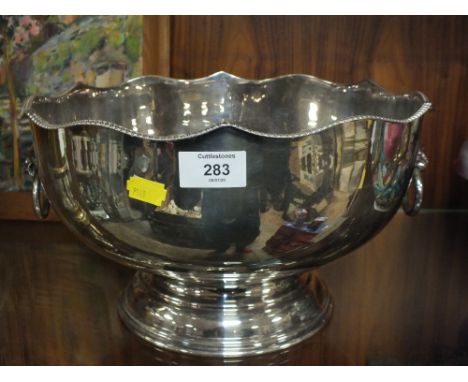 A SILVER PLATED TWIN HANDLED PUNCH BOWL AND CUPS