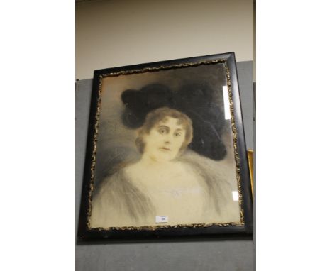 A HEAD AND SHOULDER PORTRAIT STUDY OF A LADY WEARING A LARGE BLACK HAT, signed and dated 1899 middle left, pastels on paper l