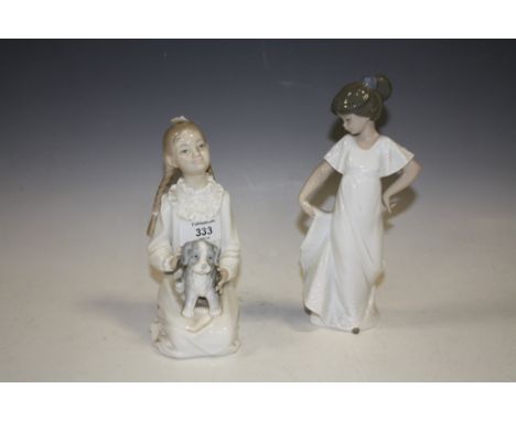 A NAO FIGURINE OF A GIRL WITH A PUPPY TOGETHER WITH A NAO FIGURINE OF A GIRL 