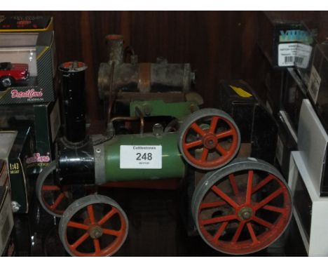 A MAMOD STEAM TRACTION ENGINE TOGETHER WITH ANOTHER