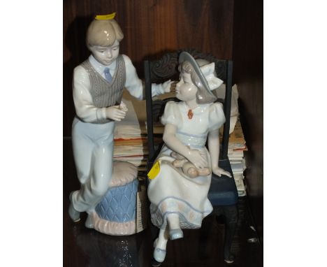 A COLLECTION OF 7" SINGLES TOGETHER WITH A PAIR OF NADAL CERAMIC FIGURES
