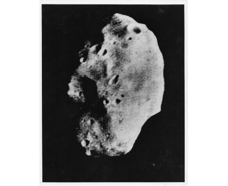 Space.- Phobos, Mariner 9, 1979; vintage gelatin silver print on fibre-based paper, NASA caption printed on the verso, 255 x 