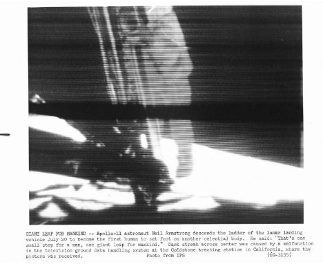 Space.-  TV camera view of Neil Armstrong descending the lunar ladder, Apollo 11, July 20, 1969; vintage gelatin silver print