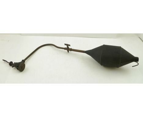 A LATE VICTORIAN/EARLY EDWARDIAN "SHOWMAN'S" LANTERN having a black tin reservoir, with suspension hook, brass pipe with tap 