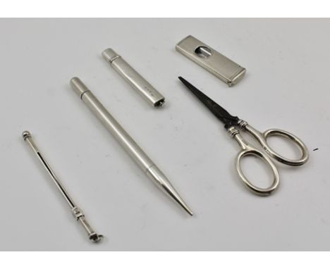 A COLLECTION OF SILVER ITEMS includes a cocktail swivel stick, propelling pencil, pencil holder, cigar clipper and silver han