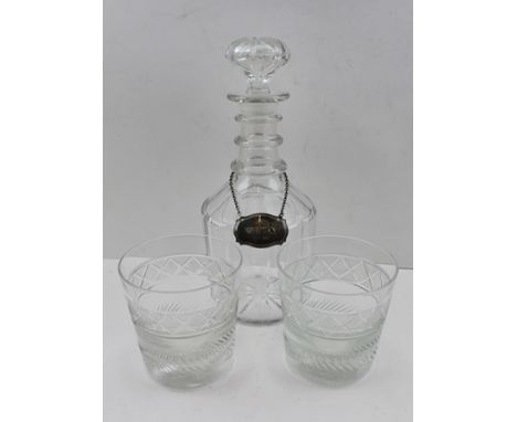 A GEORGIAN TRIPLE RING NECK GLASS DECANTER WITH STOPPER with SILVER "WHISKY" LABEL, together with a PAIR OF 19TH CENTURY CUT 