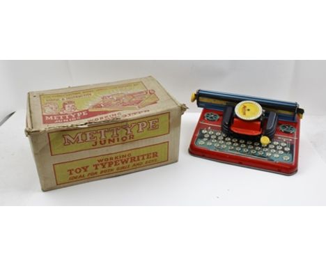 A "METTYPE" JUNIOR WORKING TIN-PLATE TOY TYPEWRITER, in original vendor's box 