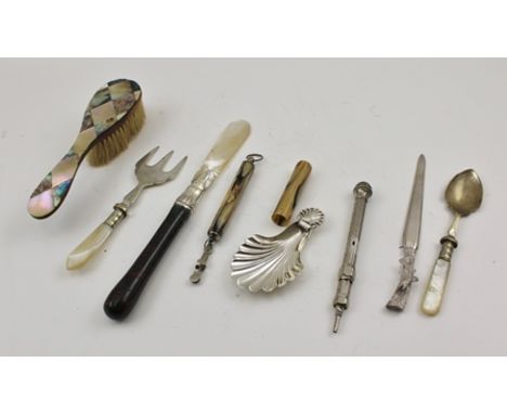 A VICTORIAN PAPER KNIFE WITH POLISHED STONE HANDLE AND MOTHER-OF-PEARL BLADE a plated scallop shape CADDY SPOON, SCALES conce