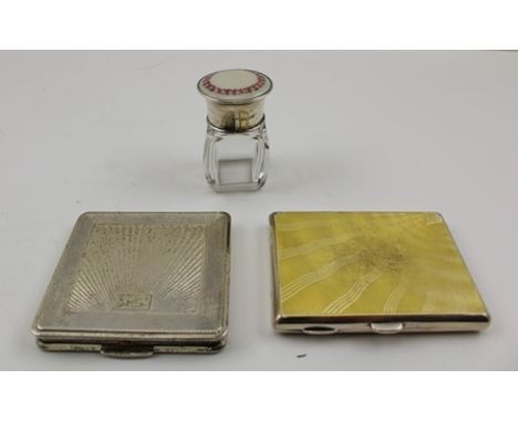 A SILVER AND ENAMEL CAPPED SMALL GLASS JAR. Birmingham 1938, 5.5" high, together with A SILVER POWDER COMPACT and a YELLOW EN