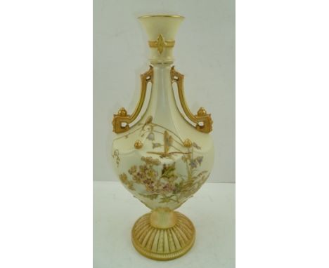 A ROYAL WORCESTER TWIN-HANDLED VASE, pattern no. 1535, having flared rim to neck, geometric handles, ivory ground with gilded