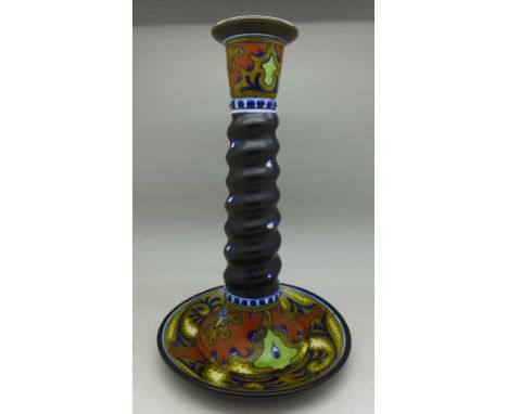 A Gouda Art Deco Rhodian pattern candlestick, 1573 back stamp, 25cm