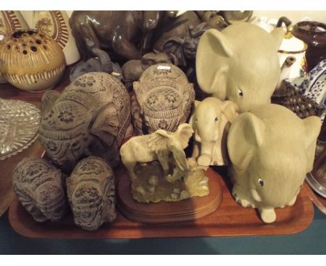 A Tray Containing Various Ceramic Elephant Ornaments.