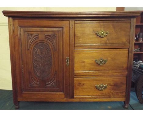 An Edwardian Side Cabinet with Carved Panel Door to Shelved Section and Three Side Drawers.