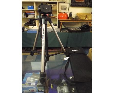A Velbon Camera Tripod in Carrying Case.
