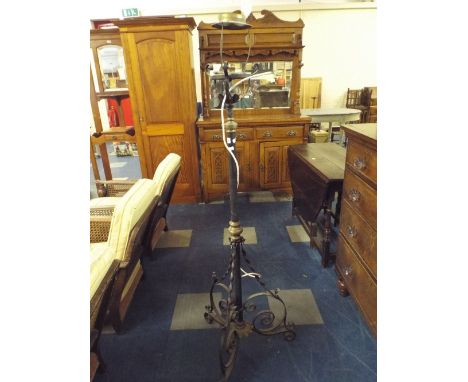 A Victorian Adjustable Wrought Iron and Brass Oil Lamp Stand Converted to Electric. 