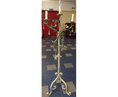A Painted Wrought Iron and Crystal Decorated Tripod Lamp Stand with Scrolled Feet.