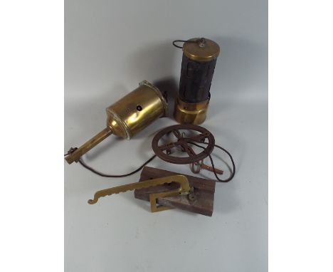 A Brass Clock Work Meat Jack, Brass Safety Lamp and A Brass Range Crane.