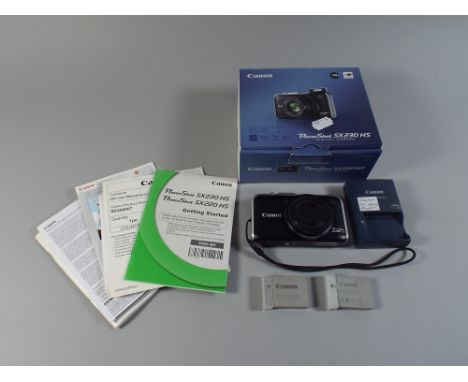 A Boxed Canon Power Shot SX230-HS Digital Camera with Instructions Disk Etc.