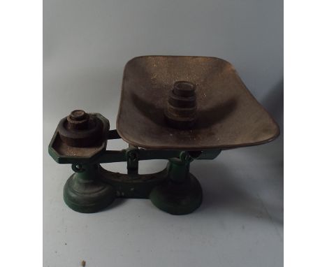 A Set of Kitchen Scales and Weights.