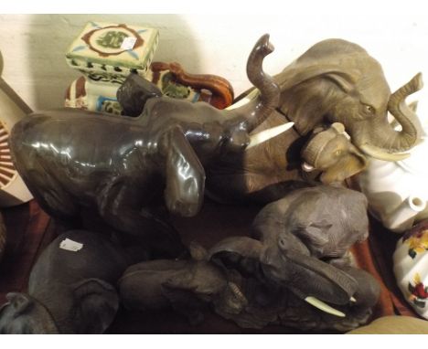 A Tray Containing Various Ceramic Elephant Ornaments.
